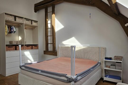 Schlafzimmer mit alten Dachstuhl